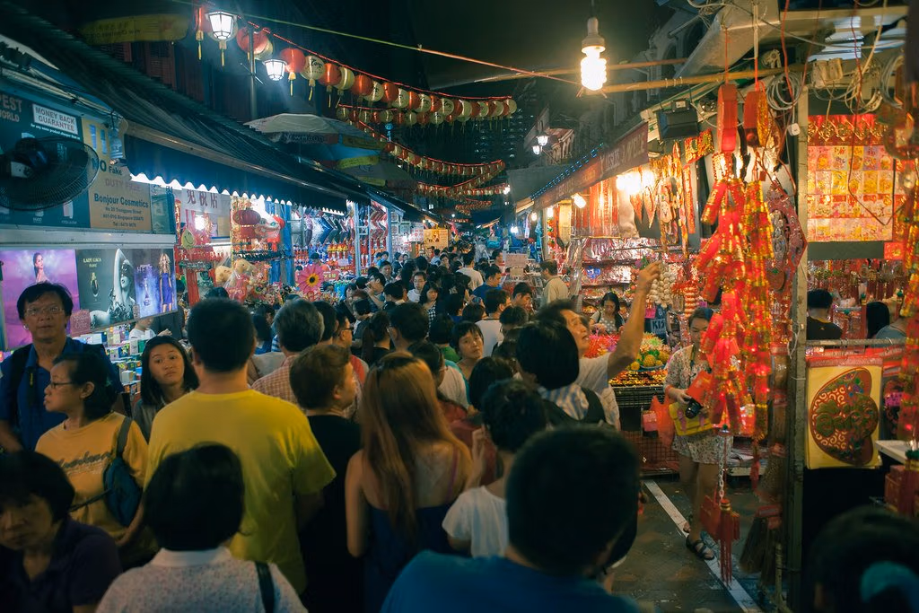 38 China Travel Tips Only Locals Know 11 A Crowd Of People In A Street