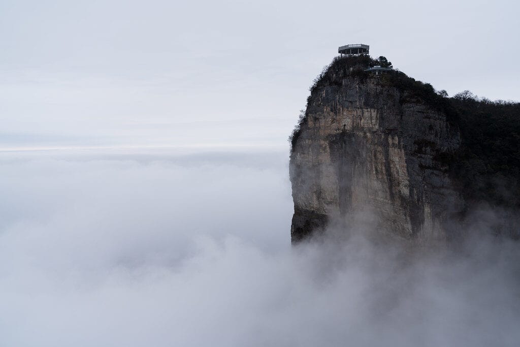 Mountain Peak Above Foggy Landscape