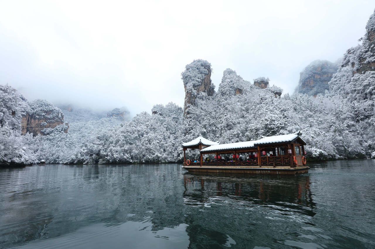 In January 2023, Visitors Enjoyed Winter Water Activities Amid The Ice-And-Snow Scenery At Baofeng Lake Scenic Area. Photo By Wu Yongbing.
