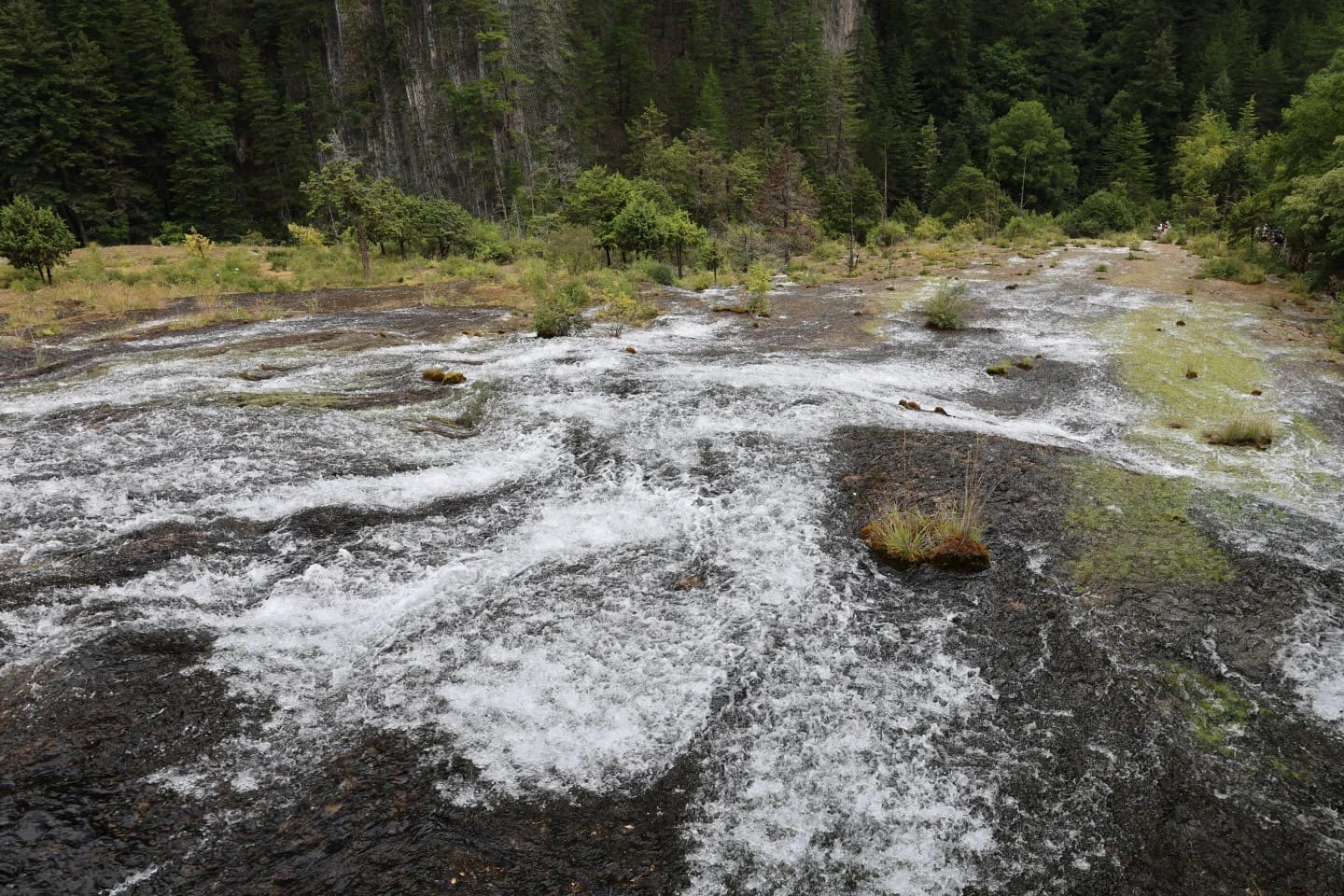Rushing Water Over Rocky Terrain.