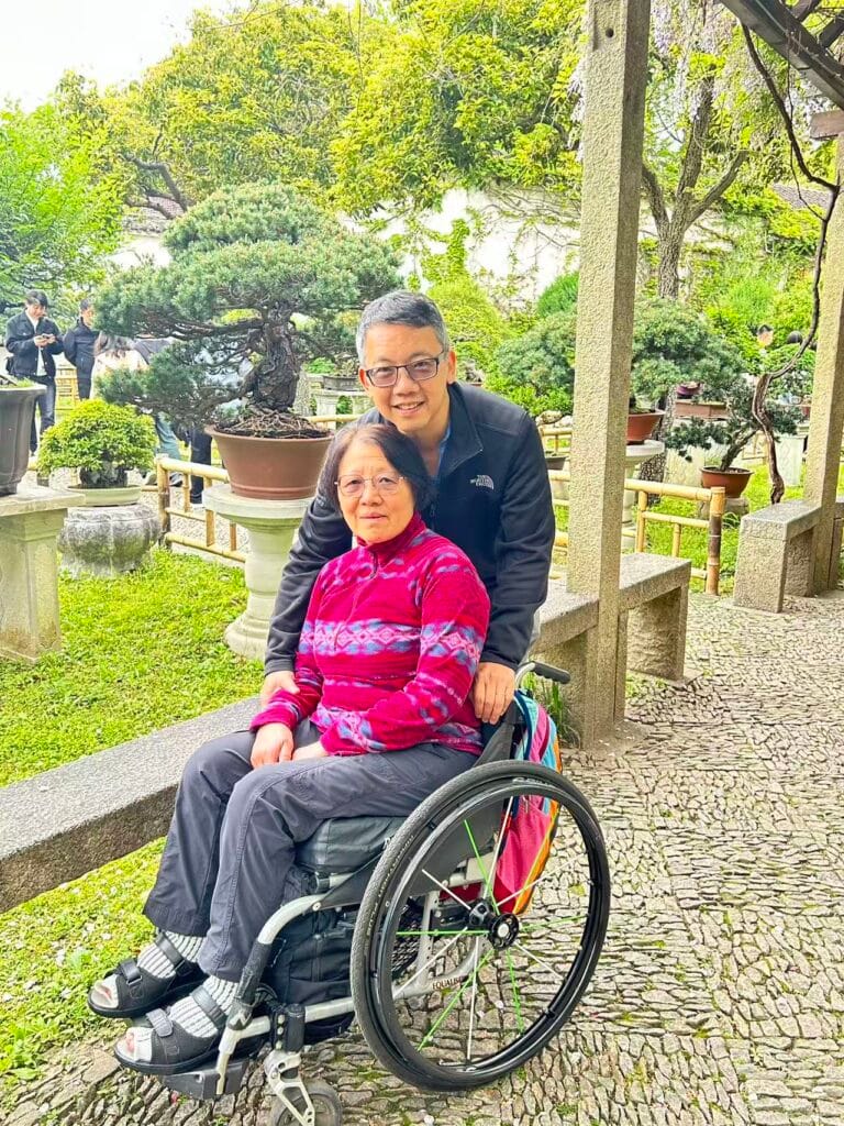 Australian Guests Tony And His Wife Hue Admiring Bonsai At The Lingering Garden, April 2026.