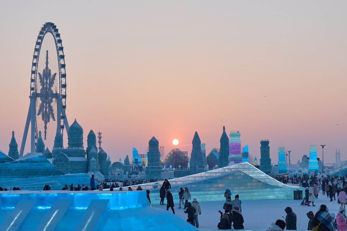 Harbin Ice And Snow World: The Ultimate 2025/2026 Insider'S Guide 3 A Group Of People Standing Around An Ice Sculpture