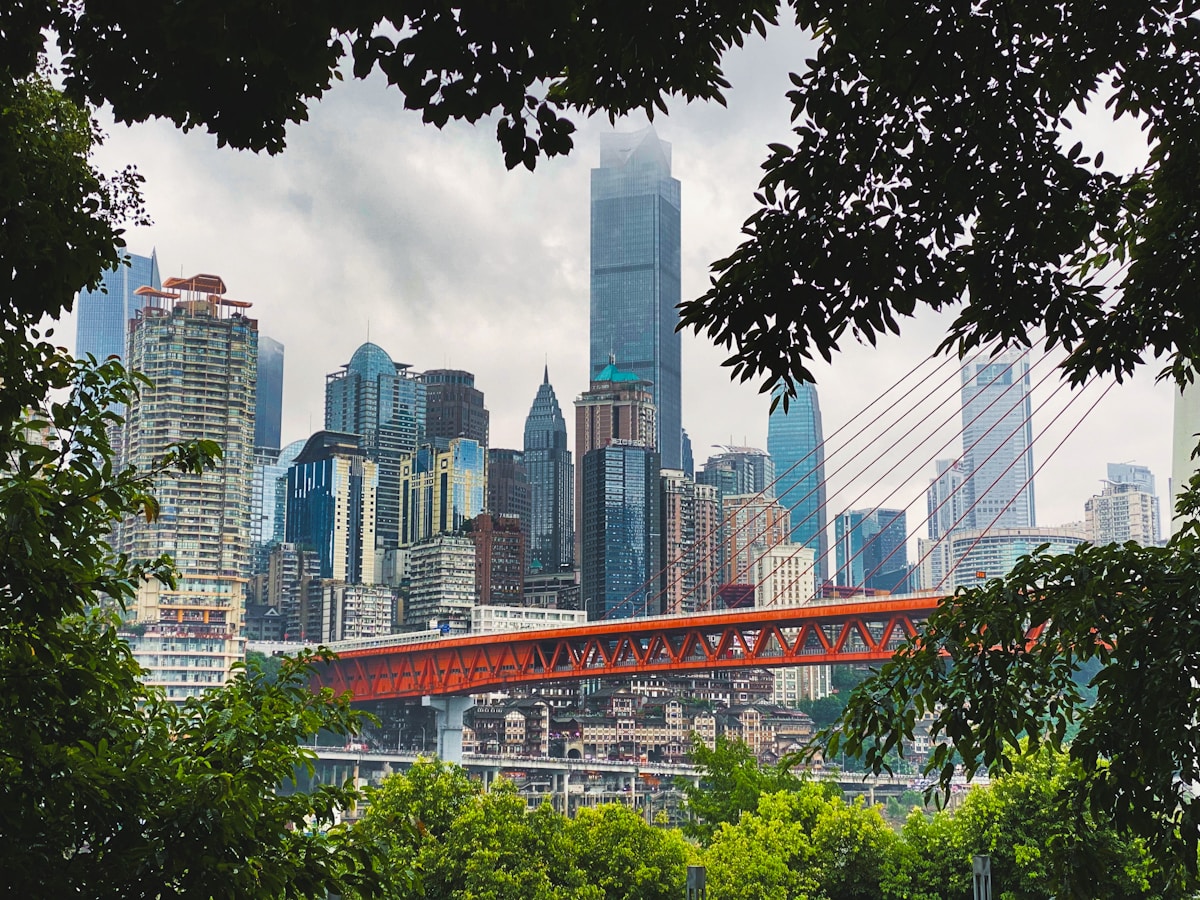 Chongqing: Complete Insider'S Guide To China'S 8D Magic City 12 City Skyline Under White Cloudy Sky During Daytime