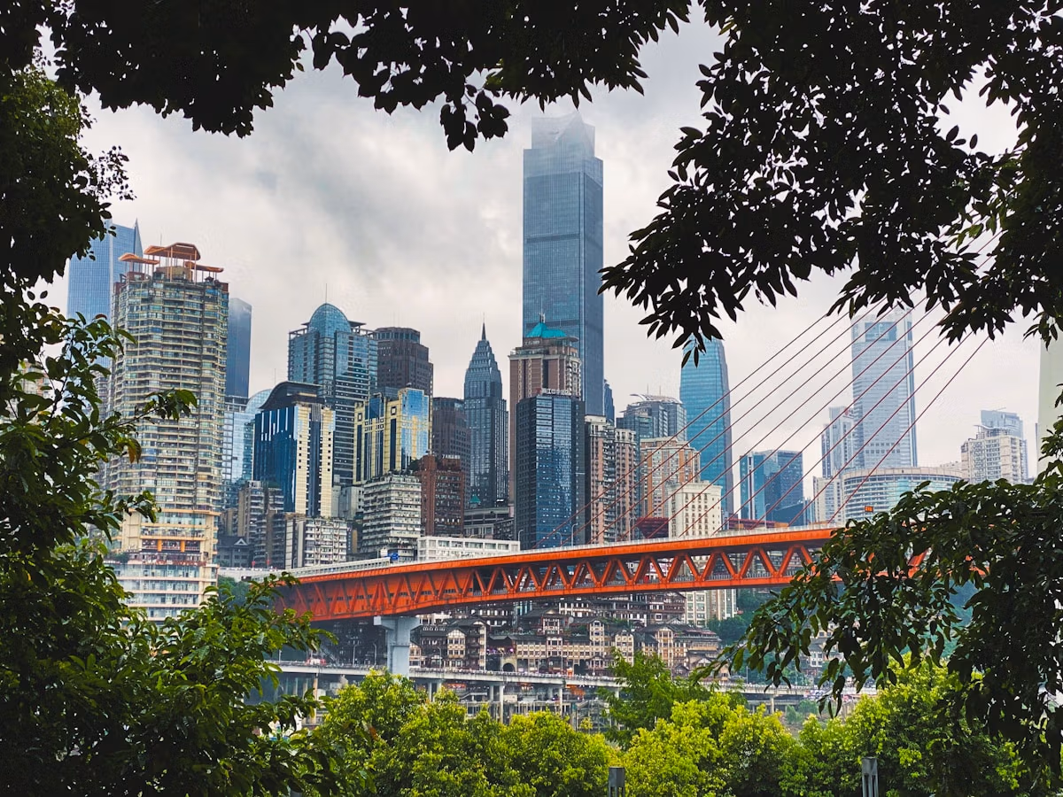 Chongqing: Complete Insider'S Guide To China'S 8D Magic City 12 City Skyline Under White Cloudy Sky During Daytime
