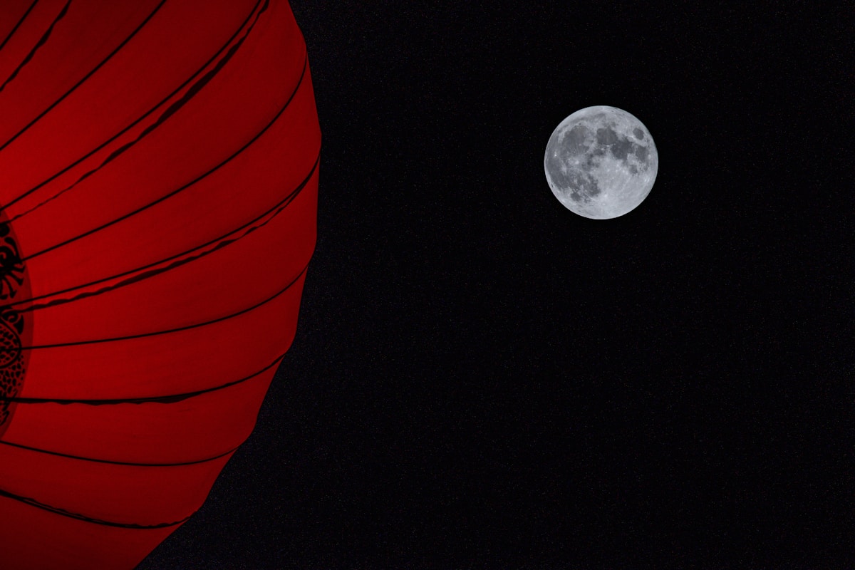 Seeing The Stars: A Traveler'S Guide To Light Pollution In China 5 A Full Moon Is Seen Behind A Red Umbrella
