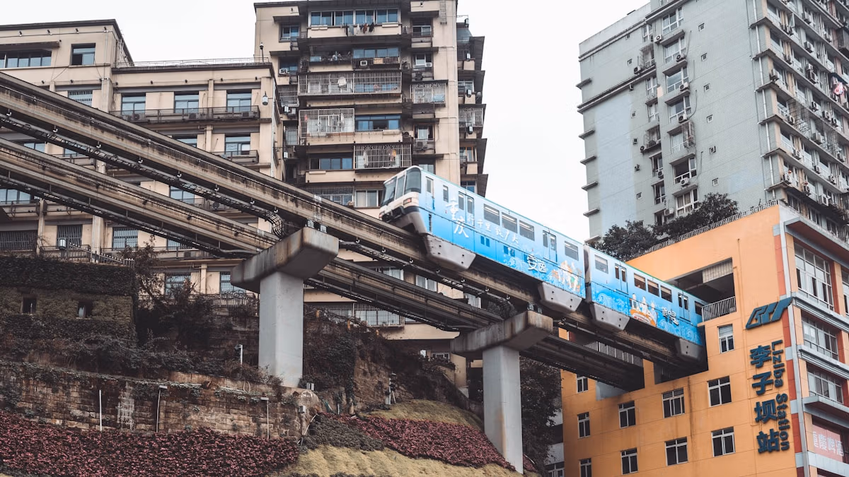 Chongqing: Complete Insider'S Guide To China'S 8D Magic City 9 Blue Train On Rail Tracks Near Building During Daytime