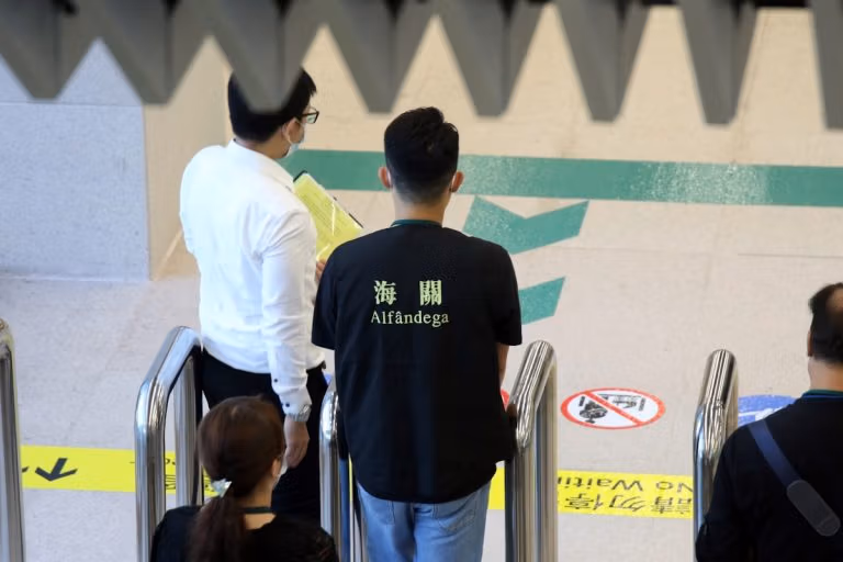What Not To Bring To China: Essential Tips For Travelers 12 Man In Black Crew Neck T-Shirt Standing Beside Man In White T-Shirt