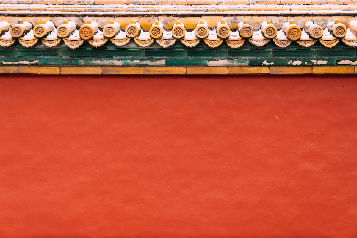 Forbidden City 20 A Close Up Of A Red Wall With Yellow And Green Trim